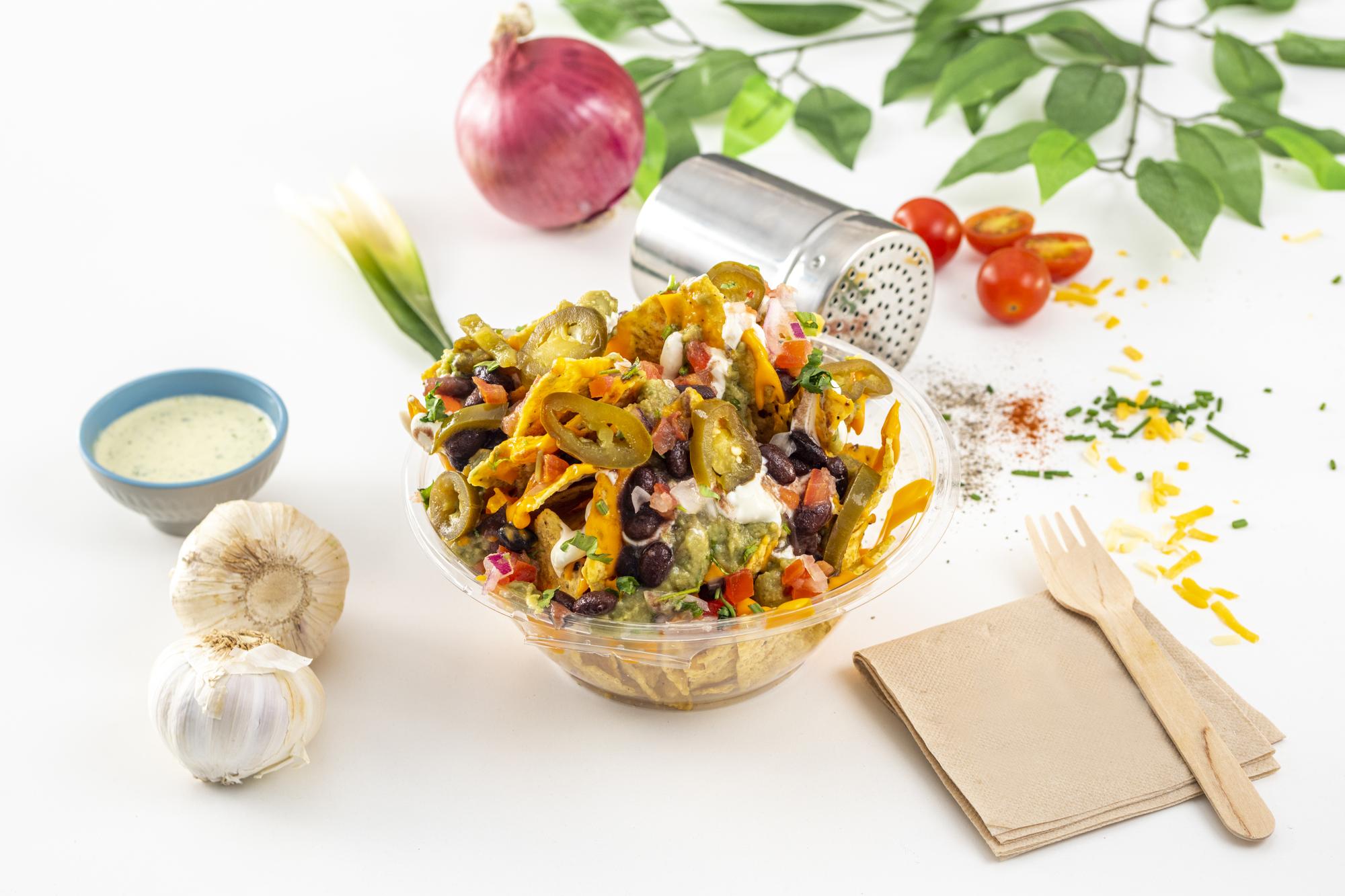 close-up roasted vegetable bowl with herbs